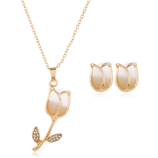 Three-Piece Set Of Crystal Earrings and Necklaces and Rings