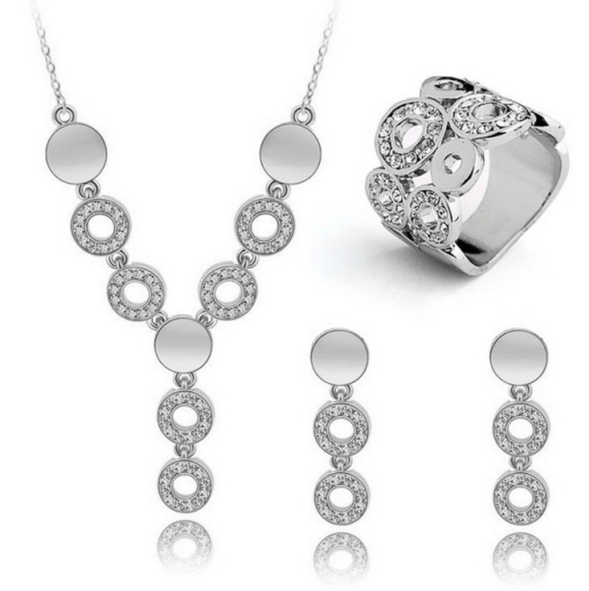 Three-Piece Set Of Crystal Earrings and Necklaces and Rings