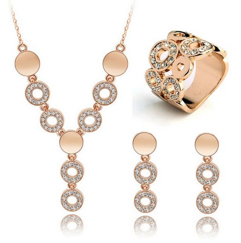 Three-Piece Set Of Crystal Earrings and Necklaces and Rings